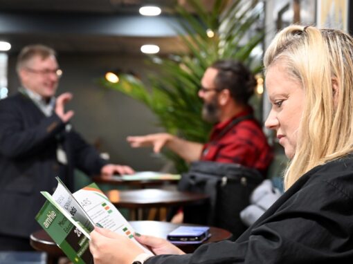 An attendee checks the schedule at our Leeds conference in 2024.