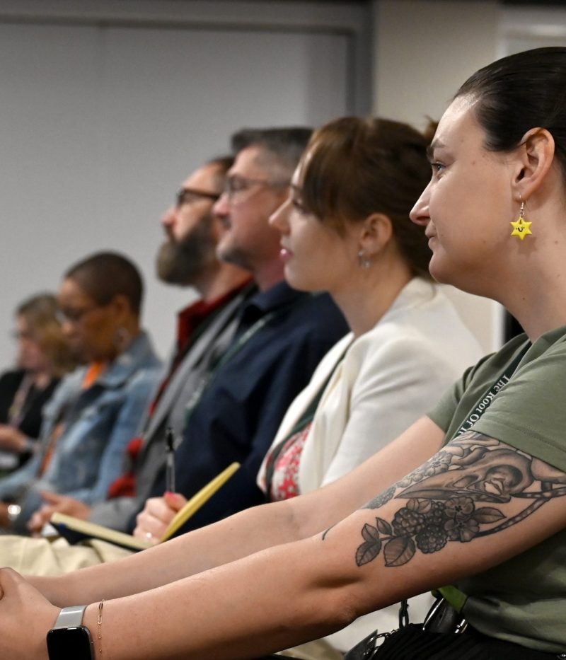 AMHIE members watch a presentation for free at our regional event in Leeds